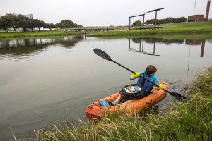 Kayaks are checked out to TR students through Backwoods so they can ride along the Trinity River and clean up the trash in and among the banks March 21 as part of the campus’ Day of Service. Photos by Erik Marroquin/The Collegian