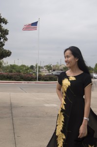 Huong Dinh wears an ao dai, the traditional dress of southern Vietnam. The SE hospitality management student moved to the United States from Vietnam two years ago. Photo by Linah Mohammad/The Collegian