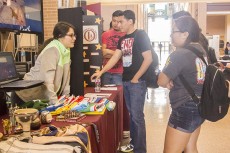 SE students stop to talk about the award-winning club Organization of Latin Americans.  Collegian file photo