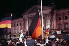Germans in Berlin raise the nation’s flag in celebration of the country’s reunification in 1990.German Federal Archives
