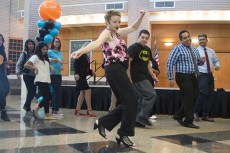 NE communication arts chair Linda Quinn teaches ballroom dancing during TCC’s Hispanic Heritage Month celebration.Photos by Christina Feyisetan/The Collegian