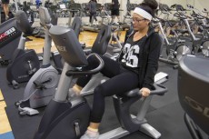 NW student Natalie Hernandez finds her groove while working out in the campus gym. Christina Feyisetan/The Collegian