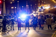 Protesters form a circle at an intersection in Chicago following the release of a dash-cam video. Some TCC students agree they often feel wary of police intervention in situations.Armando L. Sanchez/Chicago Tribune/MCT