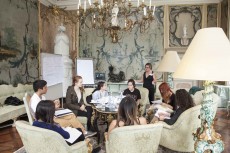 South English instructor Samantha Vallee (in black dress) leads a discussion with TCC students in Salzburg, Austria.Photo courtesy Lauren Gordon