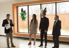 Stepping Stone founder Colin Petty introduces fellow NW students Tarrah Lott, Jeremy Brinkley and Roberto Quintanilla as they model what good business interview attire looks like in their Feb. 6 event.