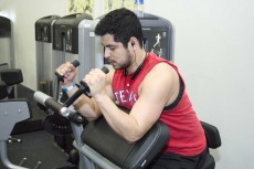 South student Samuel Saucedo lifts weights during his free time. A SE associate professor set out to measure any relationship between physical activity and brain function for class.Bogdan Sierra Miranda/The Collegian