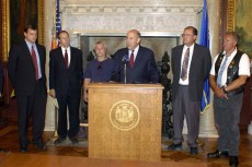Officials gather with Steven Avery after the Avery Bill passes the Wisconsin State Assembly in 2005. The Netflix show Making a Murderer documents Avery’s case.Photos courtesy of Netflix