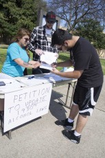Two supporters in favor of updating alcohol laws visit NE Campus to gain signatures for a petition.Katelyn Townsend/The Collegian