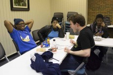 Jared Broadus, Charniecia Gardner and Sean Pearce of South’s Anime Club talk excitedly with one another. The club, led by senior office assistant Amanda Sims, is described by treasurer Jordan Pierce as “interesting, deep and intense.”Photos by Katelyn Townsend/The Collegian