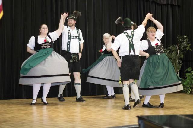 Bavarian+and+Tyrolean+folk+dancers+take+the+stage+at+NE+Campus%E2%80%99+International+Festival+April+12.+Students+were+treated+to+several+different+traditional+dances+and+music+styles.Photos+by+Bogdan+Sierra+Miranda%2FThe+Collegian