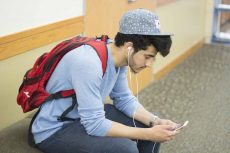Mohammad Al-Saad listens to his favorite music as he waits for his next class to begin while on SE Campus.Bogdan Sierra Miranda/The Collegian