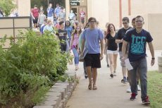 Students walk through NE Campus during a tour as part of a new student orientation Aug. 26. Upperclassmen suggest new students keep a planner, join a study group and take detailed notes during class.Bogdan Sierra Miranda/The Collegian
