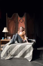 Student Lauren Kirkpatrick stars in a South one-woman play during spring 2014. South will feature a student-written play, We the People, in its first fall production this year.