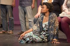 Cast member Ebony Wesley stares at Dido as she sings her aria about her feelings toward Aeneas. This is the first time in decades NE Campus has staged an opera.
