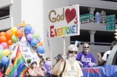 The Central Texas United Methodists for Inclusion group marches during the parade.