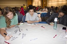 NE students brainstorm methods for connecting with people at the Nov. 9 seminar. They came up with ideas like asking questions or saying hello. Kaylee Jensen/The Collegian