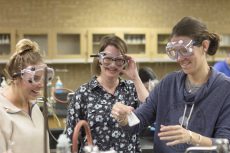 NE Chancellor’s Award winner Susan Patrick monitors students Jessica Justice and Tracey Young in the lab while they synthesize aspirin in one of her chemistry courses. Photos by Bogdan Sierra Miranda/The Collegian