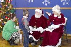 Santa Claus and his wife greet children and their families for a holiday celebration Dec. 2. TR’s sign language program co-sponsored an event to give deaf or hard-of-hearing children a chance to communicate with Santa. Bogdan Sierra Miranda/The Collegian
