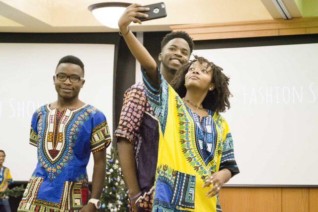 Students+who+participated+in+the+event+take+selfies+while+wearing+traditional+African+dashikis%2C+loose+colorful+shirts+or+tunics+that+originated+in+west+Africa.+The+event+was+hosted+by+the+SE+Campus+African+Culture+Club.+