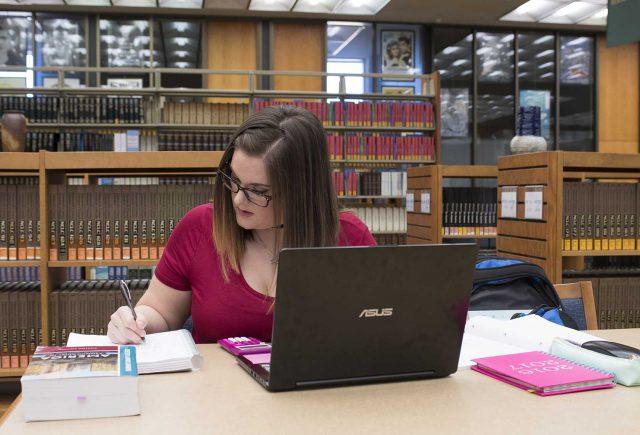 NE student Rhesa O’Brien uses planners to stay organized. She says it helps with her ADHD and dyslexia.

Peter Matthews/The Collegian