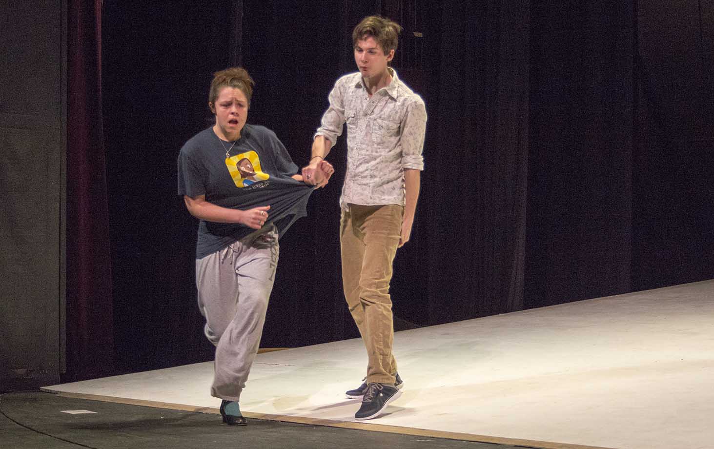 Ophelia, played by Caitlin Ferguson, runs from Hamlet, played by Jake Blakeman, during a rehearsal of Hamlet at the NE playhouse.