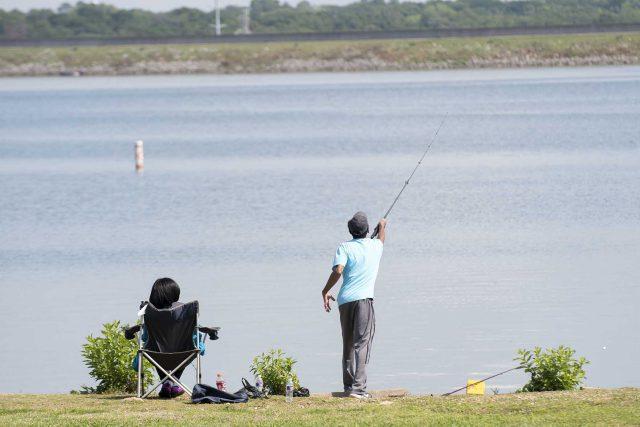 Fishermen cast their lines into Lake Arlington. Bluestone Natural Resources II, the Oklahoma-based energy company, has applied for a permit to place an injection well 9,300 feet from the Lake Arlington Dam. 

Photos by Peter Matthews/The Collegian