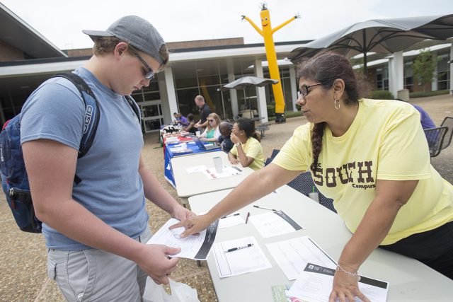 First-time college student Damain Doubrava, a South student, receives advice from transfer coordinator Sandra Bermejo during South Campus’ Howdy Week.