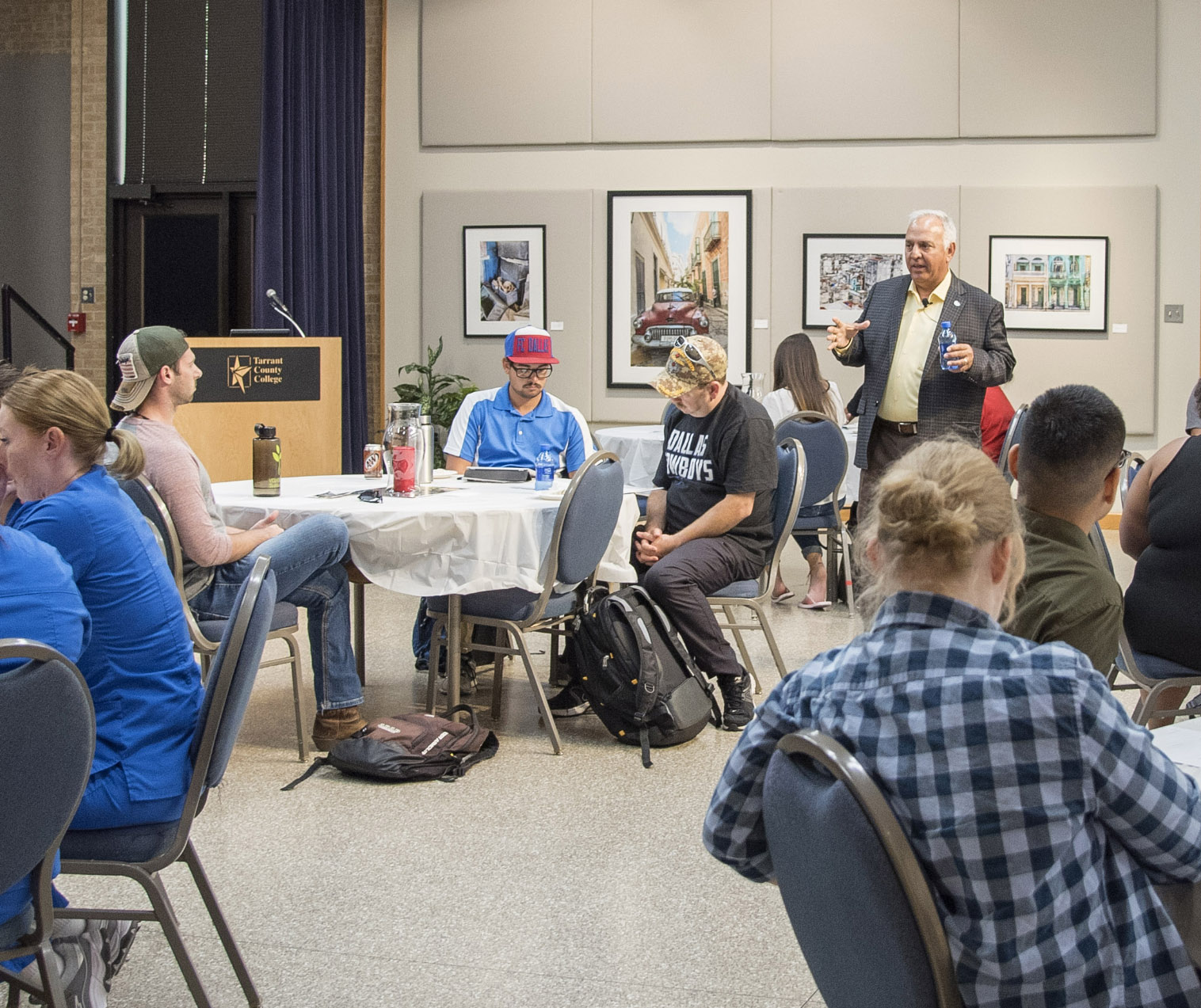 North Richland Hills’ mayor Oscar Trevino talks to students about the importance of getting involved in things that interest them during Pizza with a Purpose Sept. 20 on NE Campus.