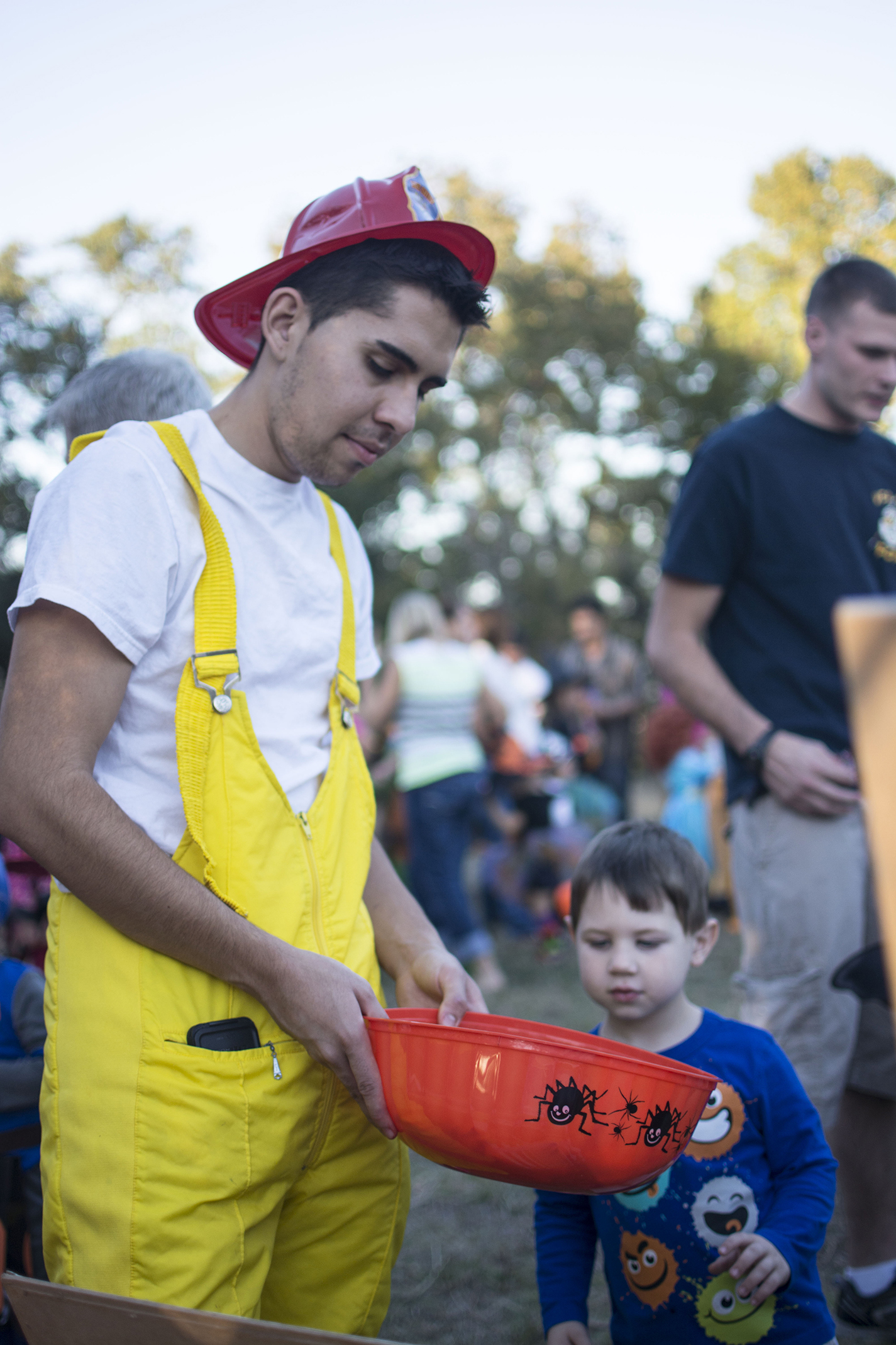 A child reaches for his Halloween treat at the SE Fall Fest in 2013.