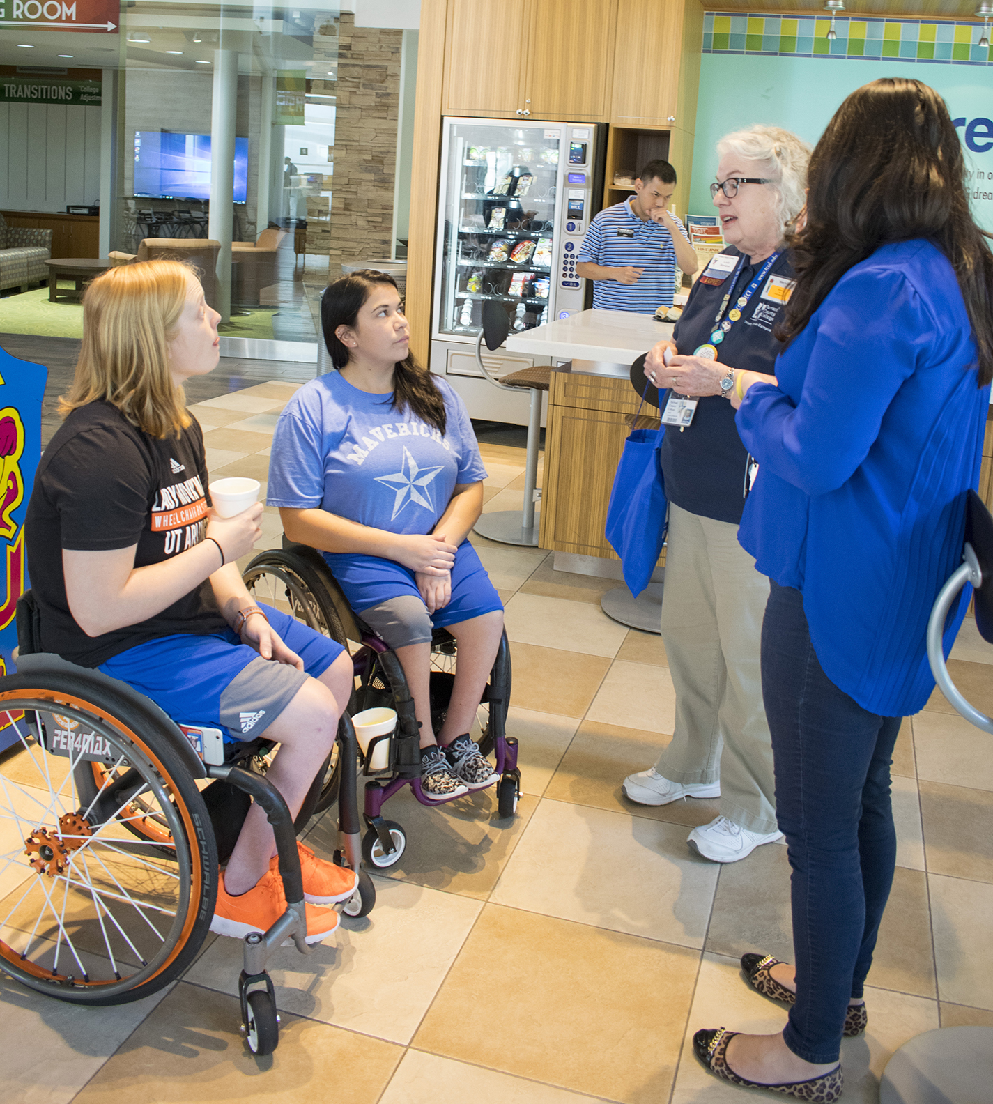 Movin’ Mavs players Morgan Wood and Mikila Salazar visit with TR student accessibility resources staff after the event Oct. 4 on TR Campus.