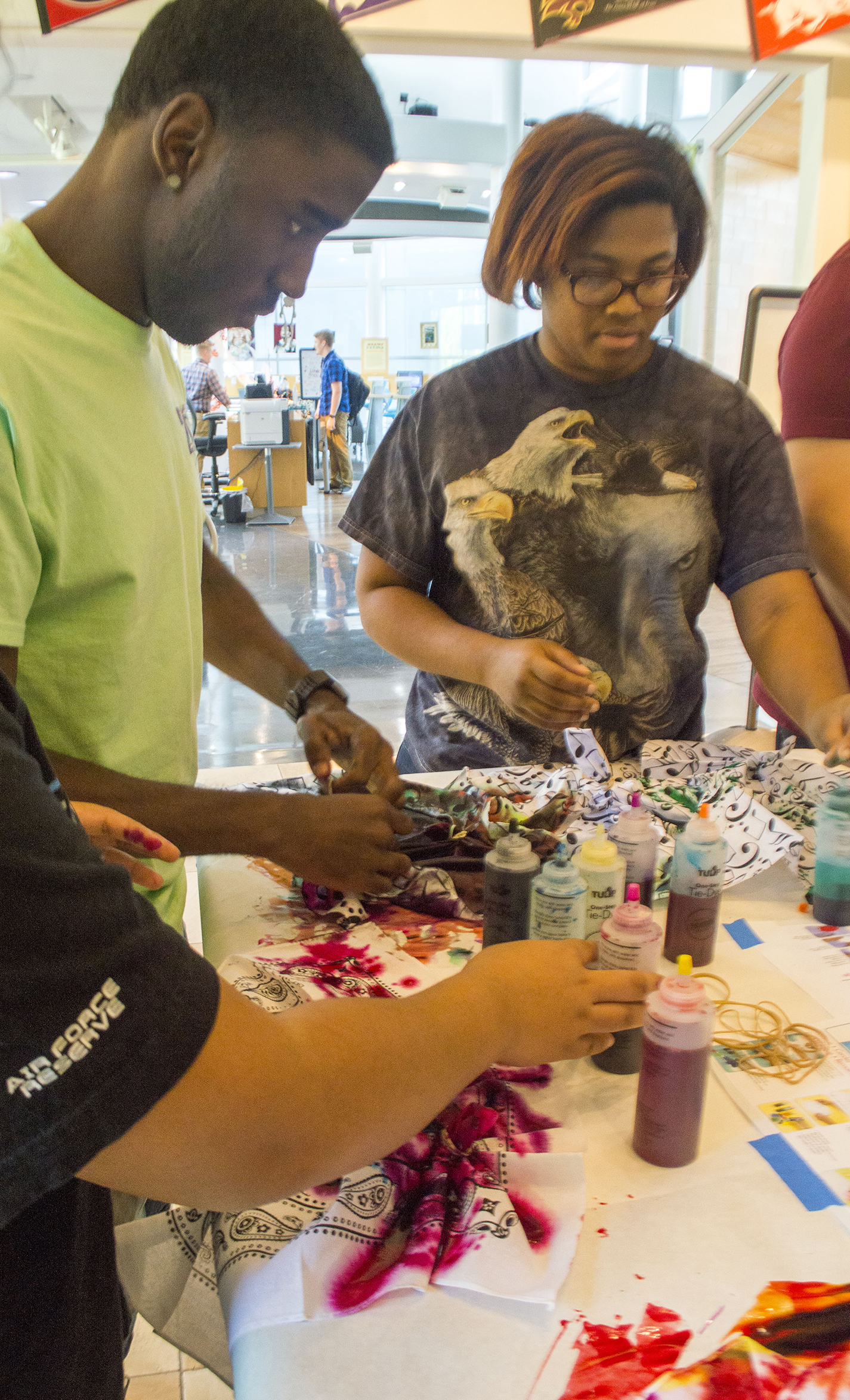 Tie Dye with T.R.E.E. was about LGBT awareness and how TCC students can come together and have fun with color. TR student Fernada Valadez (right) tie-dyes a shirt during the event Oct. 19.