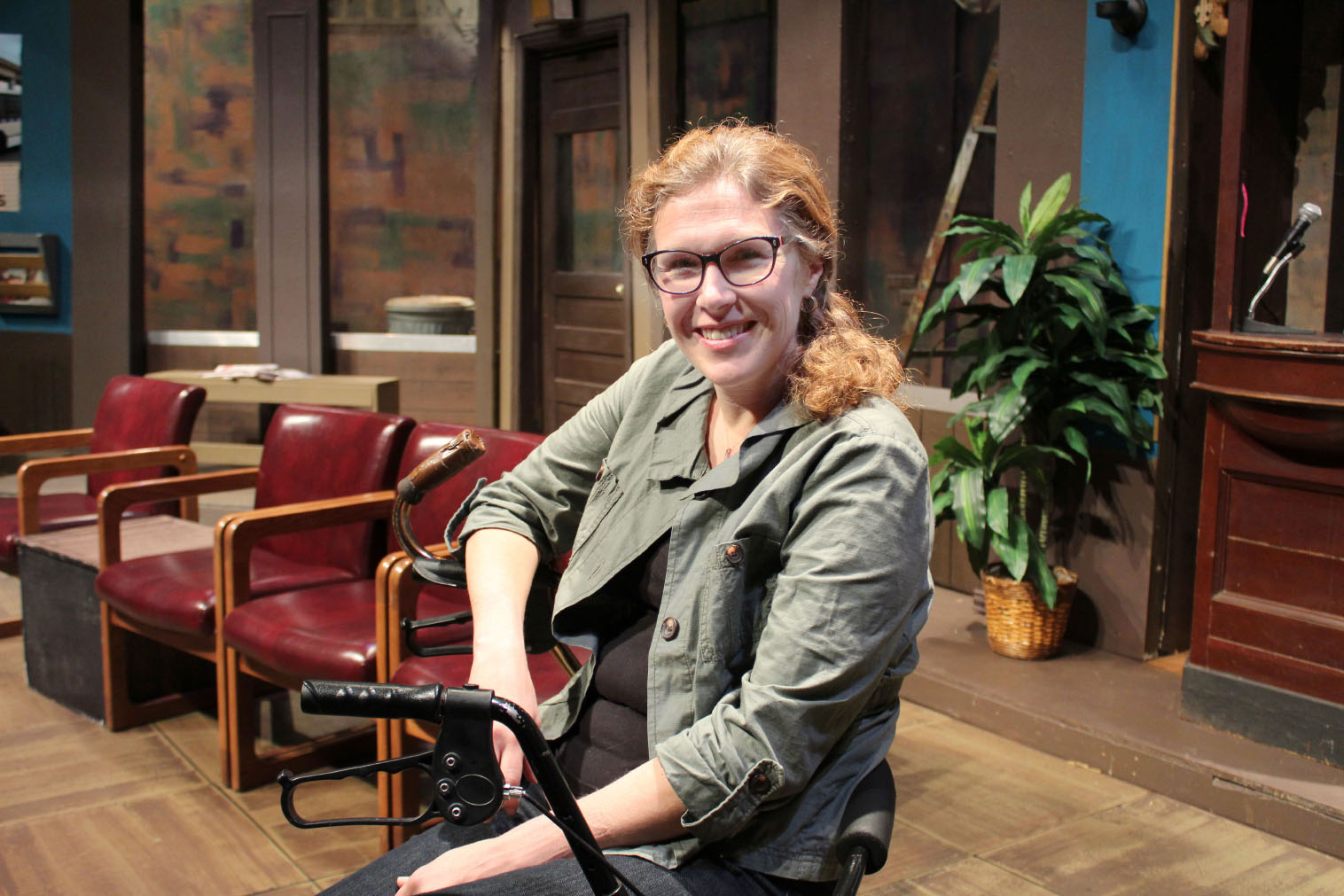 South Campus theater adjunct instructor Sherry Jo Ward sits in her walker throughout most of her play, which is based on her Stiff Person Syndrome diagnosis.