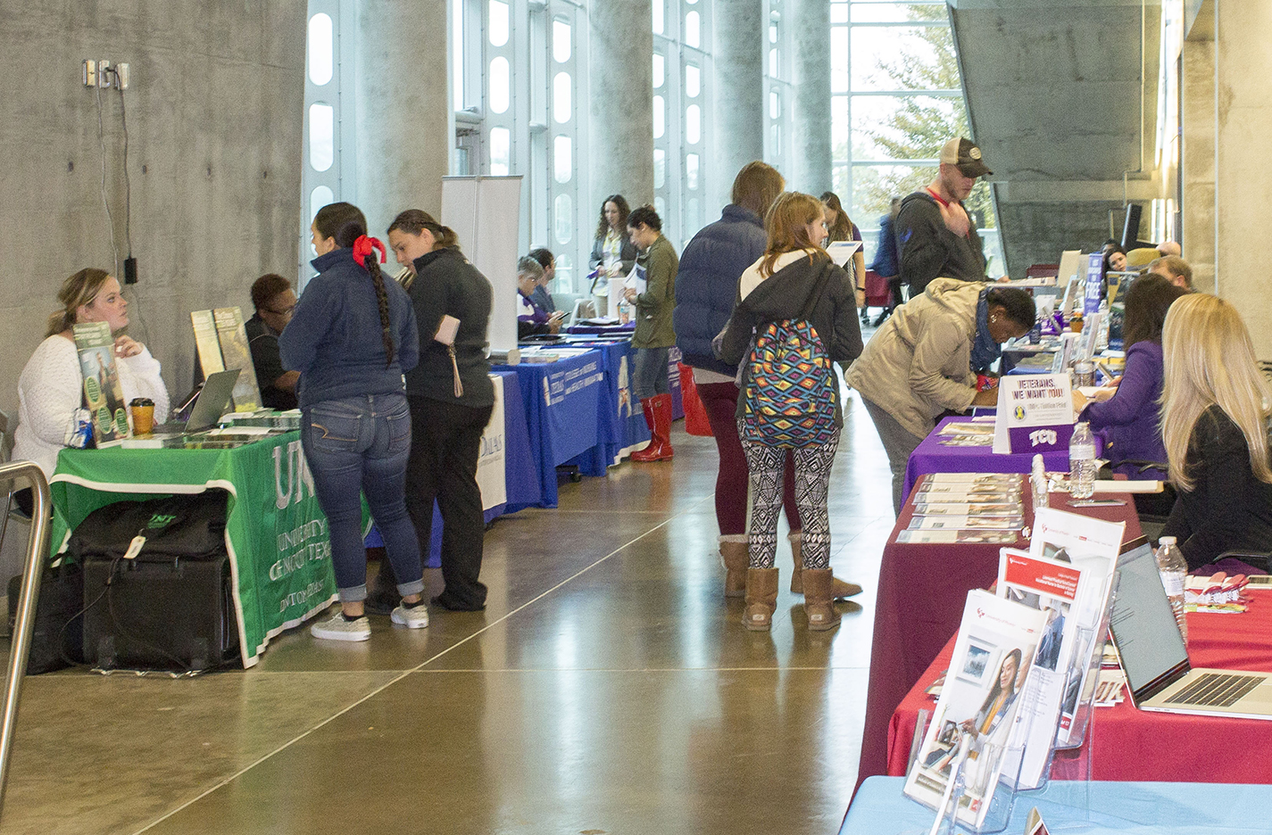 Students talk with representatives from various colleges and universities at the Health Professions Transfer Fair Nov. 8 at TREC. The fair focused on respiratory care, nursing, radiologic technology and other health care fields.