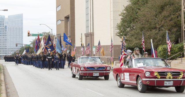 The+annual+Fort+Worth+Veterans+Day+Parade+makes+its+way+through+downtown+Fort+Worth+Nov.+11.+TR+students+provided+a+table+with+snacks+and+water+before+the+parade+began.