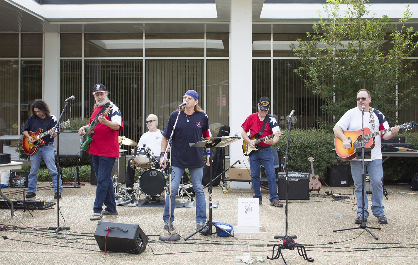 Guitars for Heroes performs at the Veterans Week Celebration Nov. 6 on South Campus. The program helps veterans overcome difficulties through music and other activities.