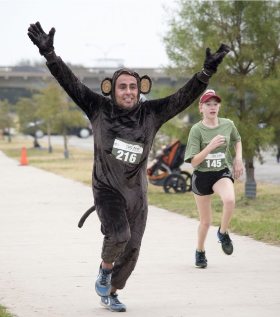 SE psychology professor Jose Velarde wore a monkey suit when he ran in the 5K race.