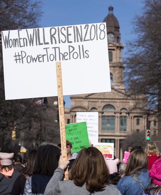 Marchers carried their signs through the streets of downtown Fort Worth. This year’s Women’s March focused on “Power to the Polls.”