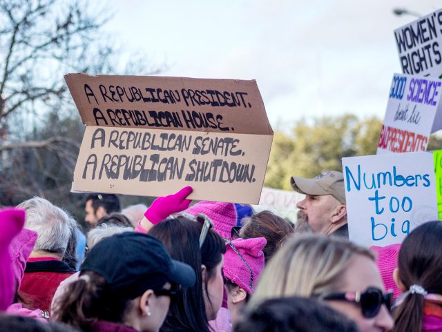Demonstrators express their disdain for the Republican-controlled Congress during the Women’s March, which took place hours after the federal government shutdown Jan. 20. 