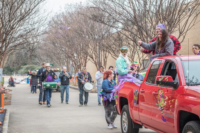 Campus instructors act as a second line band as they played during the parade Feb. 13.