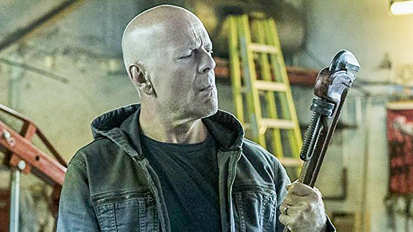 Dr. Paul Kersey (Bruce Willis) considers whether a wrench is the best tool to dole out his revenge in Death Wish.
