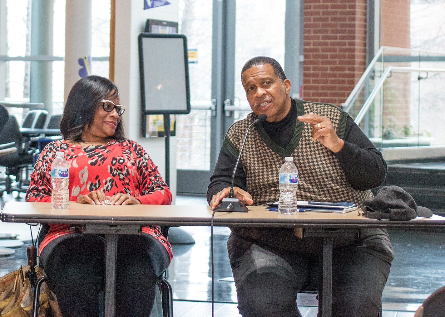 Local dentist Marie Holliday and R.D. Construction CEO and president Randle Howard discuss owning a business Feb. 28 at the Black Business Panel on TR.