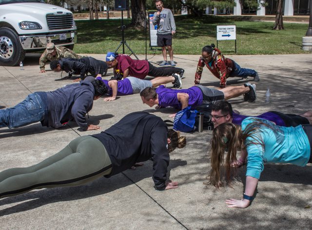 South students participate in the 22-pushup challenge to raise awareness about veteran suicide prevention during South’s community resources event. The challenge represents how many veterans commit suicide every day.