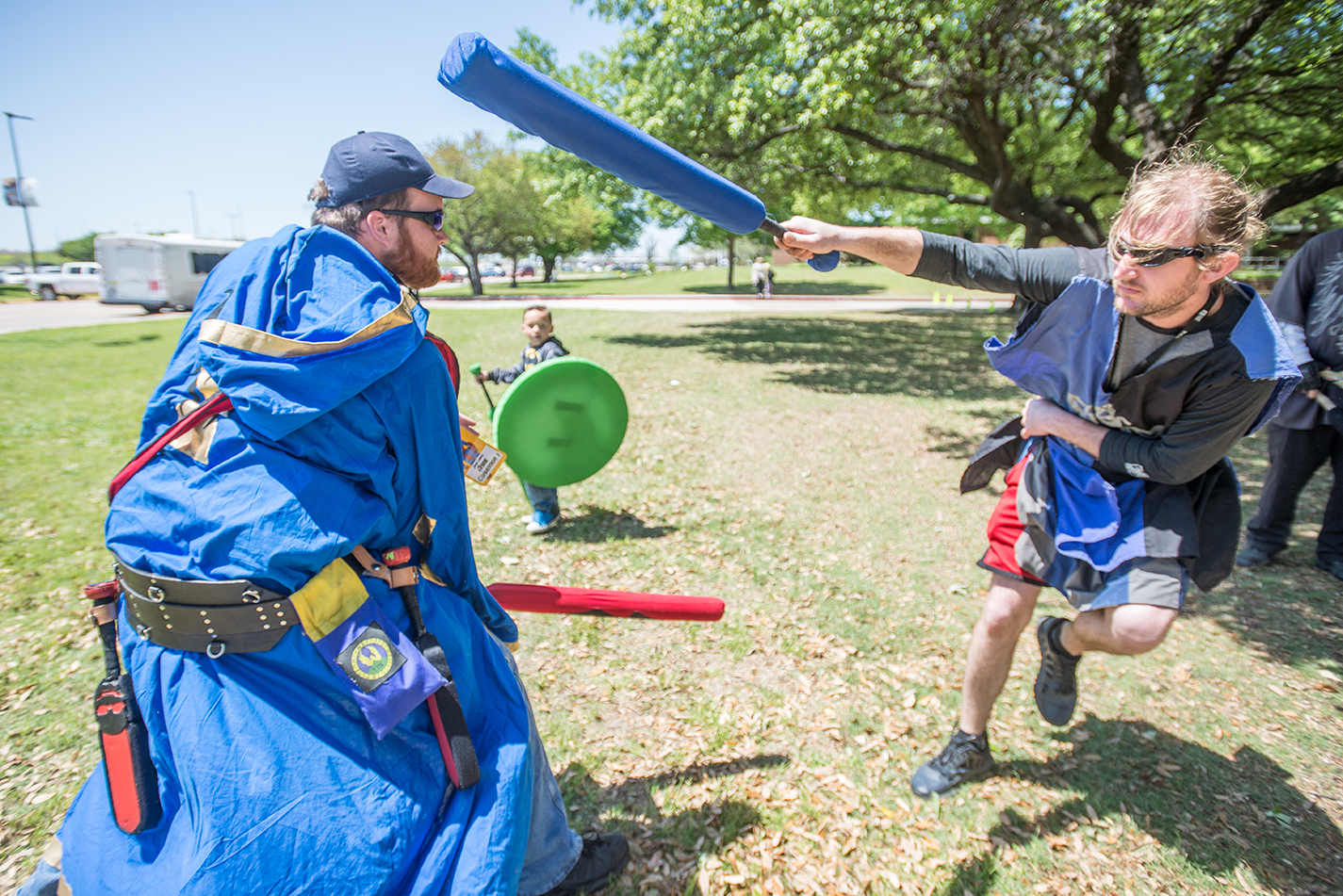 Benjamin Brace of Benbrook battles Donny “Peasant” Neff during a live action role play of a scene from Dr. Who at the South Campus Anime Convention April 14. The two-day event celebrated all things anime and gaming. See more on page 10.