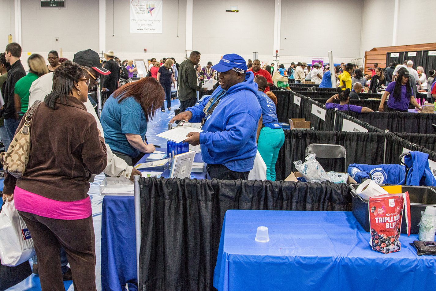 Despite the rain, community members flooded into South Campus’ gym to learn more about health, receive free screenings and learn how to cook healthy meals April 21.