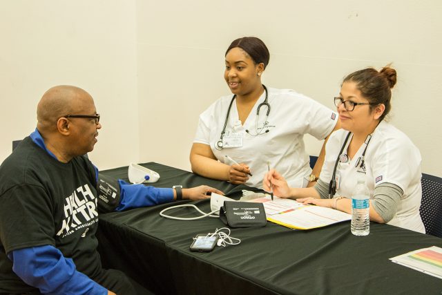 Attendees get their blood pressure checked and learn their kidney function during the African-American Health Expo April 21 on South Campus.