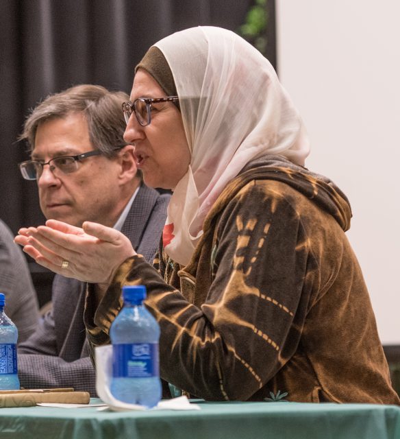 TCU faculty member Dina Maliki speaks on the panel. She was born into an interfaith family and is Muslim.