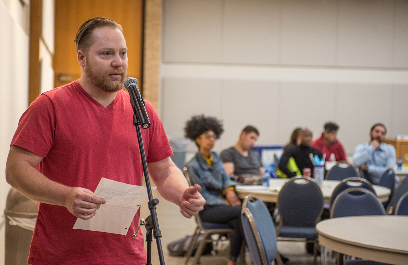 NE student Jason Gardner asks about how inclusivity affects the panel’s respective religions at the talk April 2.