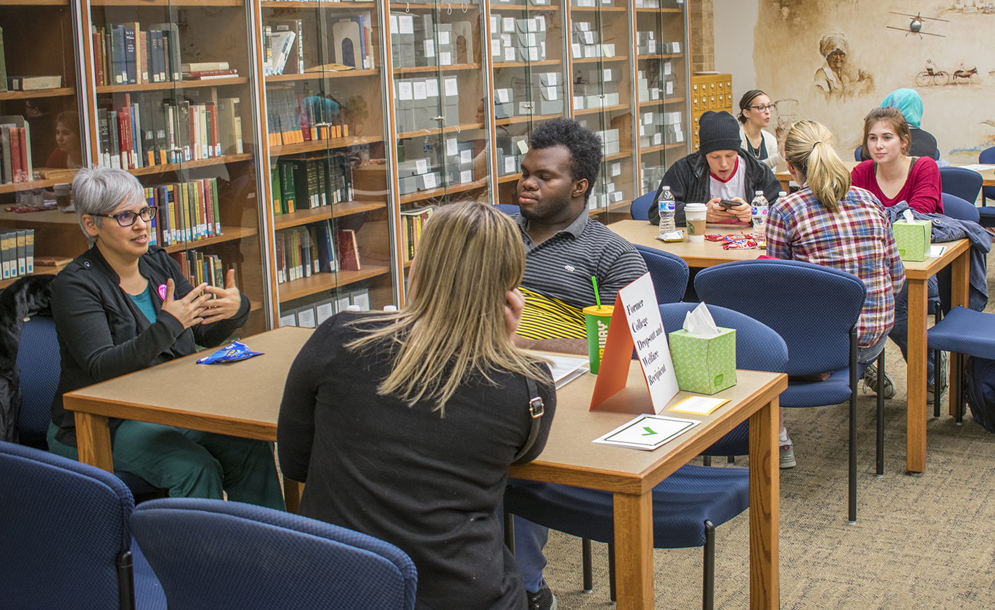 NE English associate professor Rebecca Balcarcel speaks to students about her own personal experiences and the lessons it taught her April 5 at the campus library.