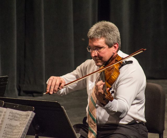 Classical violist Thomas Demer is also a successful fiddler and tenor banjo player.