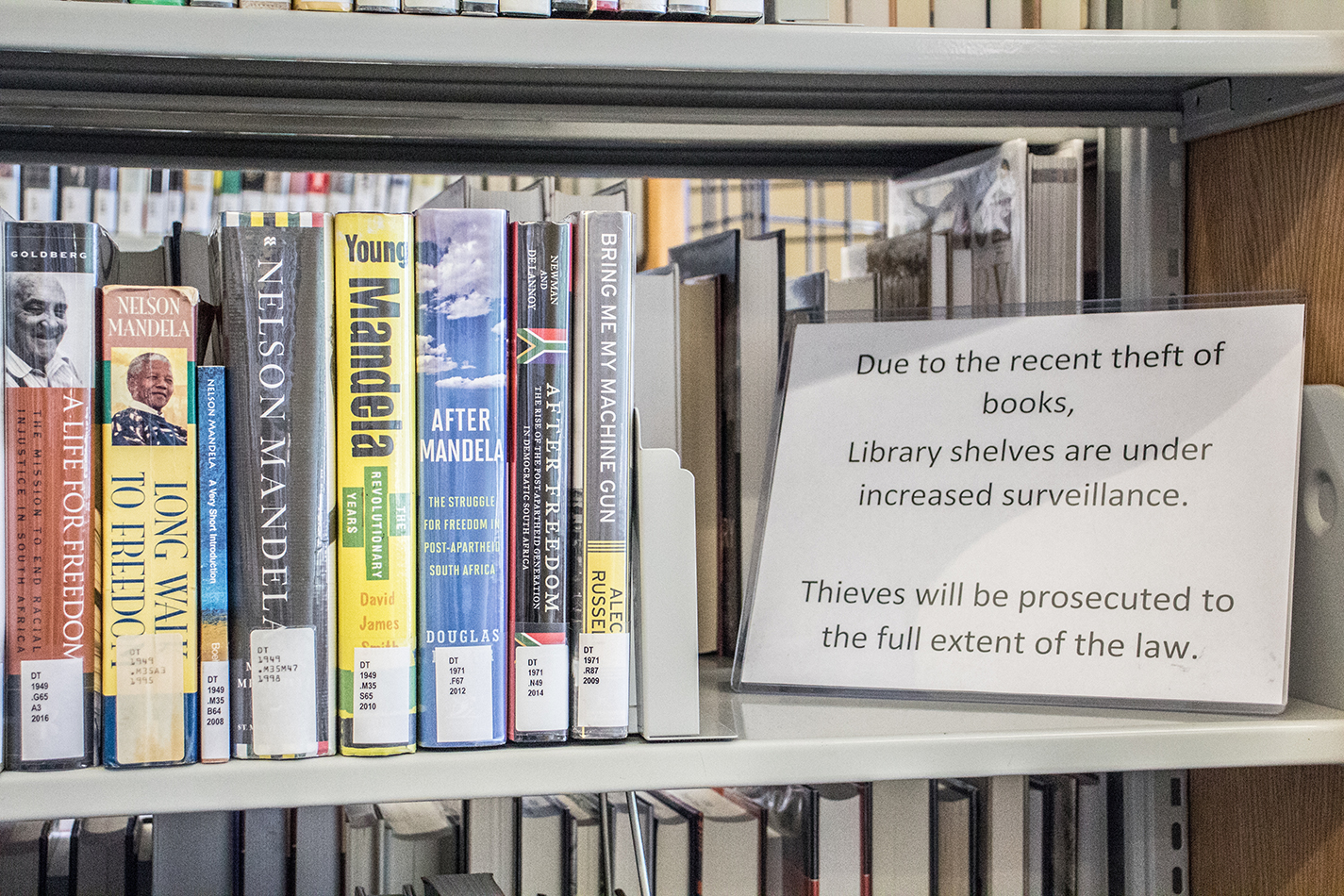 For the last two years, signs notifying students of camera surveillance sit on the bookshelves at SE Campus’ Judith Carrier Library. Campus police have access to the footage.